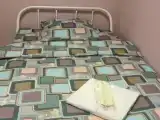 Одноместный номер без окна с общими удобствами