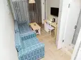 Трёхместный номер студия с балконом и с красивым видом из окна