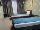 Двухместный номер с 2 отдельными кроватями стандарт