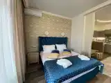 Апартаменты студия с балконом делюкс для четверых