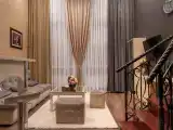 Четырёхместный номер двухуровневый люкс