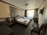 Трёхместный номер люкс