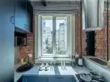 Трёхместный номер студия лофт 802
