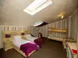 Семейный номер мансардный с 2-х ярусной кроватью