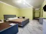 Четырёхместный номер с видом на бассейн 3