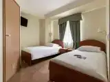 Двухместный номер с 2 отдельными кроватями полулюкс