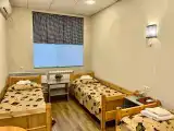 Семейный номер с отдельными кроватями
