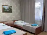Трёхместный номер с односпальными кроватями