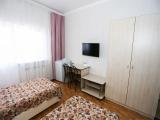 Двухместный номер с 2 отдельными кроватями или одной 2-х спальной стандарт