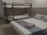 Четырёхместный номер Стандарт с выходом к бассейну