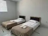 Двухместный номер с 2 отдельными кроватями Эконом с удобствами на этаже
