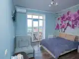 Трёхместный номер Делюкс с видом на море и креслом кроваатью