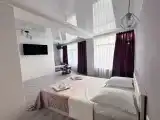 Трёхместный номер улучшенный с видом на город