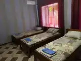 Четырёхместный номер с 4 отдельными кроватями, с собственным санузлом, холодильником и кондиционером