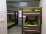 Четырёхместный номер однокомнатный стандарт 2+2 с душем и WC в коттедже Луна