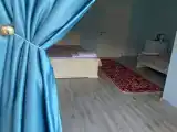 Трёхместный номер с террасой и видом на горы и реку Сулак