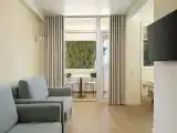 Четырёхместный номер Джуниор сюит с балконом