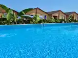 Дом из бруса у моря Африканский
