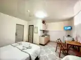Трёхместный номер студия с кухней