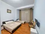 Трёхместный номер улучшенный с террасой