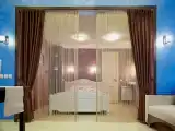 Четырёхместный номер полулюкс  с балконом