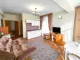 Четырёхместный номер студио с балконом и кухней