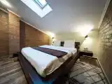 Двухместный номер с 1 кроватью мансардный кофморт