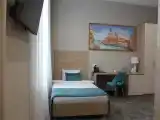 Двухместный номер с 2 отдельными кроватями Первая категория Стандарт подходит для гостей с ограниченными возможностями