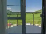 Трёхместный номер с креслом видовой