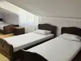 Трёхместный номер раздельными кроватями