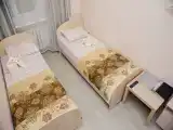 Двухместный номер с 2 отдельными кроватями бюджетный с общей ванной комнатой