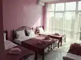 Четырёхместный номер Стандарт с балконом