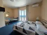Семейный номер Семейный номер с видом на море