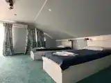 Двухместный номер с 2 отдельными кроватями джуниор сюит с  балконом