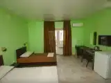 Трёхместный номер улучшенный с балконом