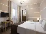 Двухместный номер с 2 отдельными кроватями стандарт на клубном этаже с балконом и видом на горы