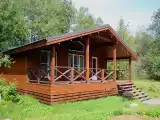 Дом с большой террасой в лесу