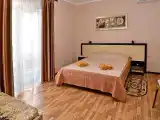 Трёхместный номер стандарт улучшенный плюс с балконом