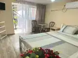 Трёхместный номер люкс