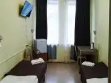 Двухместный номер с 2 отдельными кроватями эконом с частичными удобствами