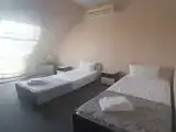 Трёхместный номер с тремя кроватями