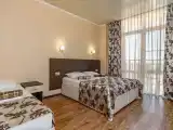 Трёхместный номер полулюкс