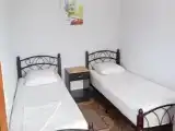 Трёхместный номер с односпальными кроватями