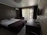 Трёхместный номер делюкс с балконом