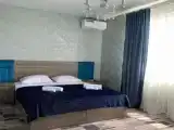 Трёхместный номер с двуспальной и односпальной кроватями