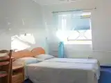 Двухместный номер с 2 отдельными кроватями стандарт с мансардным окном