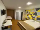 Трёхместный номер улучшенный с видом на город