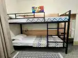 Двухместный номер с 2 отдельными кроватями бюджетный с двухъярусной кроватью