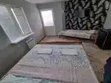 Трёхместный номер с 1 двухспальной и 1 односпальной