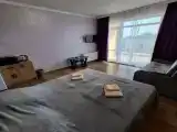Четырёхместный номер Однокомнатный люкс с балконом и видом на бассейн